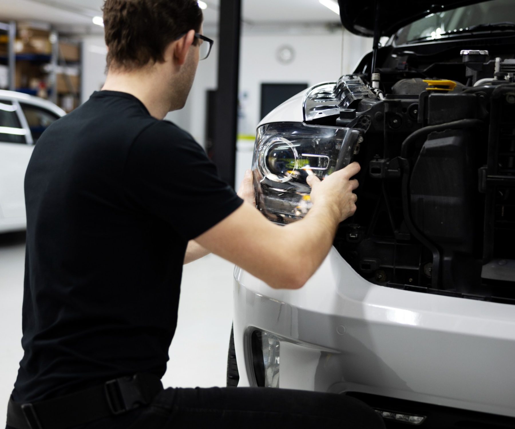 medium-shot-man-wrapping-car (2) (1)